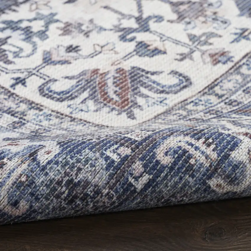 Blue and Ivory Floral Medallion Power Loom Distressed Area Rug Photo 6