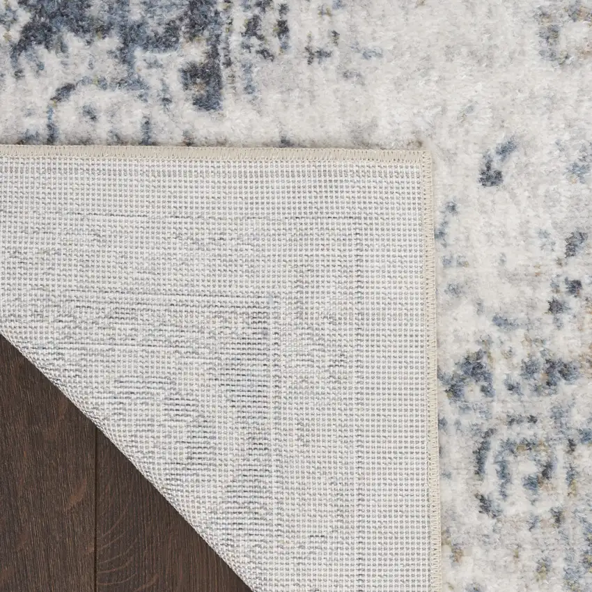 Blue and Ivory Floral Medallion Power Loom Distressed Washable Area Rug Photo 4