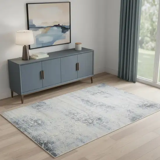 Blue and Ivory Floral Power Loom Area Rug Photo 1