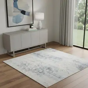 Photo of Blue and Ivory Floral Power Loom Area Rug