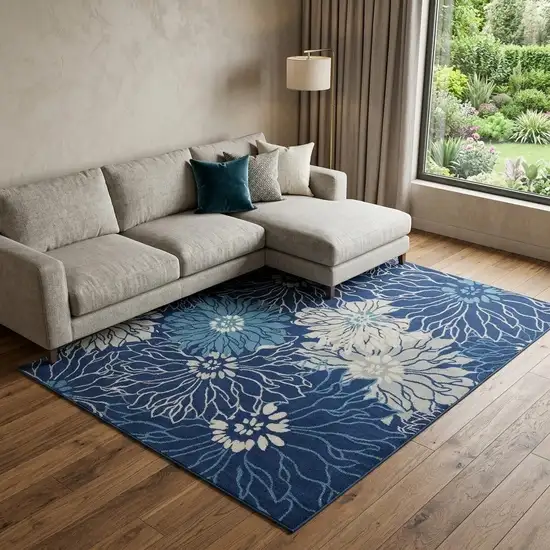 Blue and Ivory Floral Power Loom Area Rug Photo 1