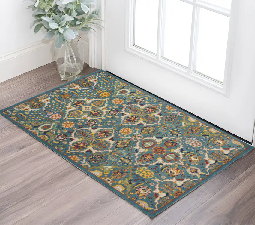 Blue and Ivory Floral Power Loom Area Rug Photo 1