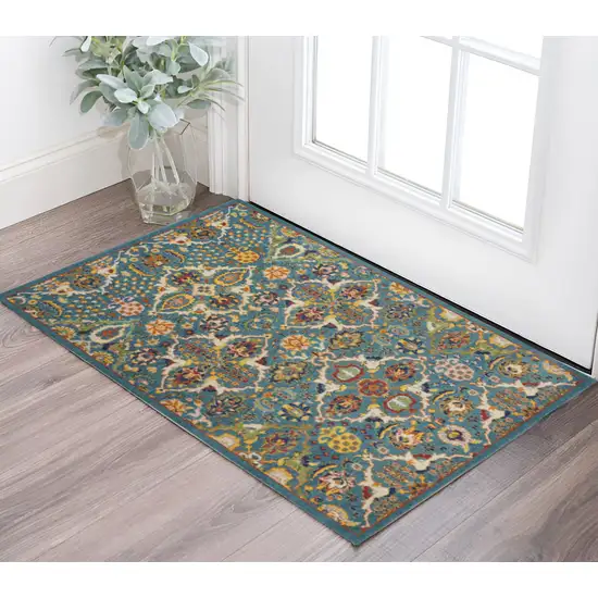 Blue and Ivory Floral Power Loom Area Rug Photo 1