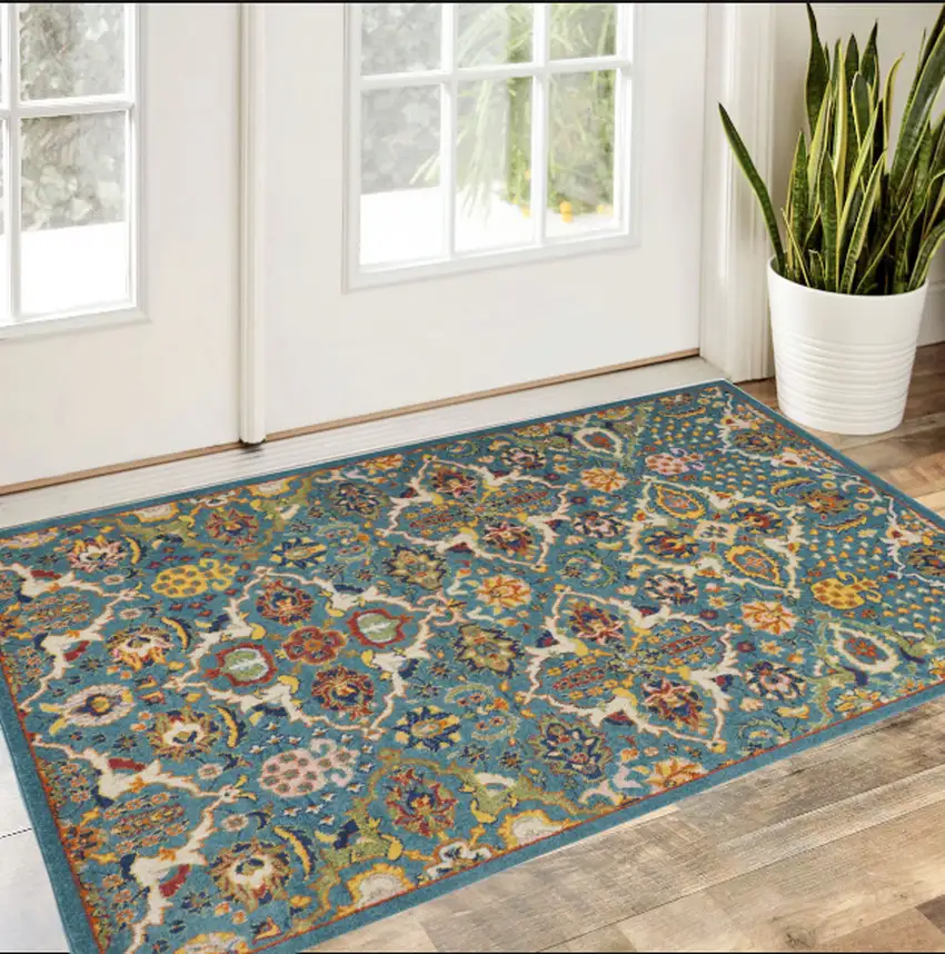 Blue and Ivory Floral Power Loom Area Rug Photo 1