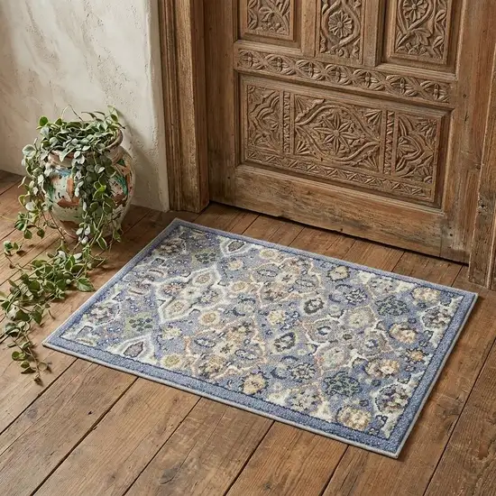 Blue and Ivory Floral Power Loom Area Rug Photo 1