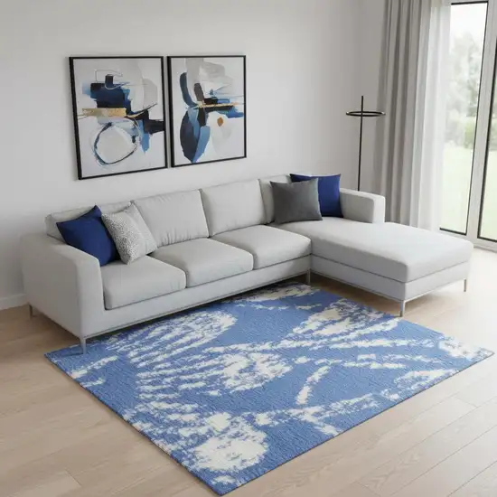 Blue And Ivory Floral Distressed Area Rug Photo 1