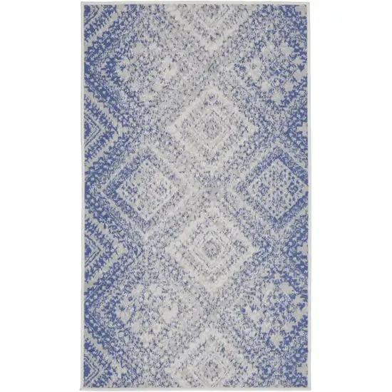 Blue and Ivory Geometric Distressed Area Rug Photo 1