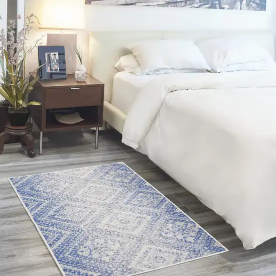 Blue and Ivory Geometric Distressed Area Rug Photo 8