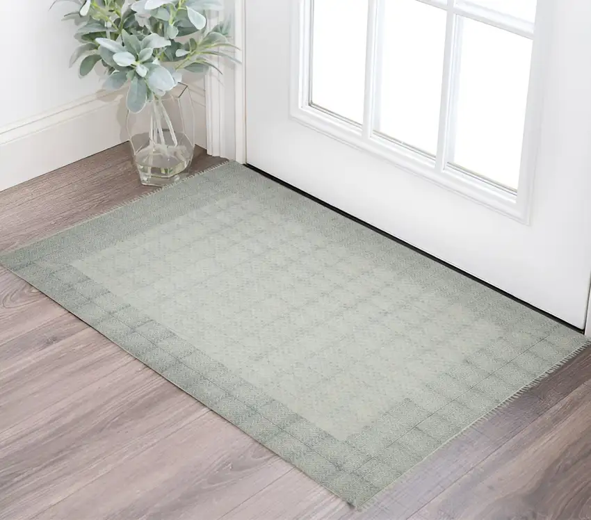 Ivory Blue and Black Geometric Flatweave Handmade Worn Faded Area Rug With Fringe Photo 1