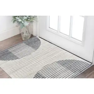 Photo of Blue and Ivory Geometric Power Loom Washable Area Rug