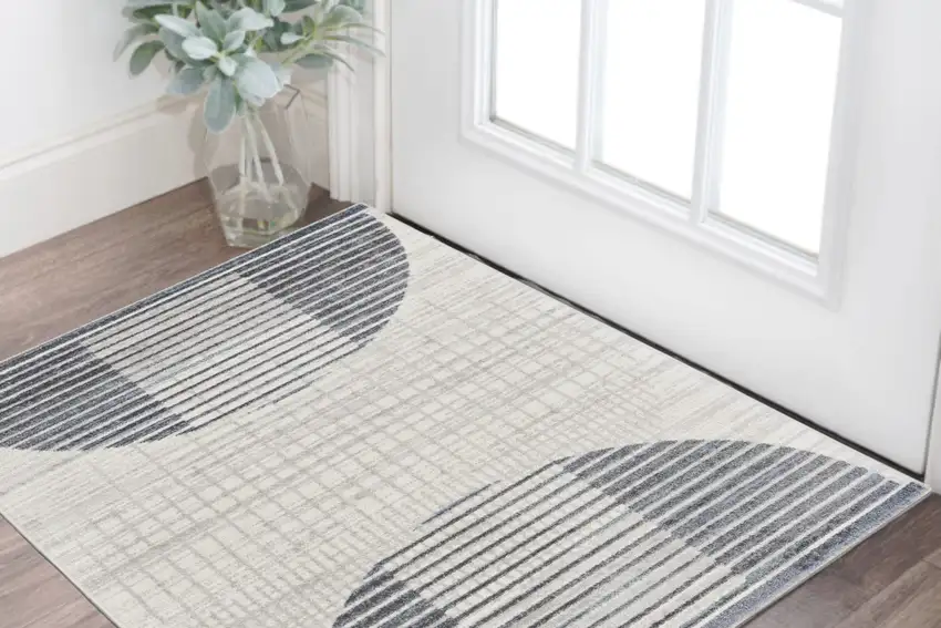 Blue and Ivory Geometric Power Loom Washable Area Rug Photo 1