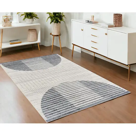 Blue and Ivory Geometric Power Loom Washable Area Rug Photo 1