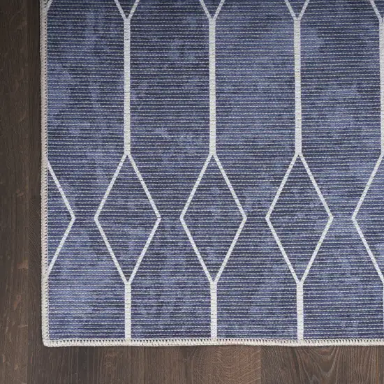 5' X 7' Blue and Ivory Geometric Power Loom Washable Area Rug Photo 7