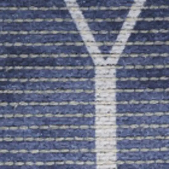 5' X 7' Blue and Ivory Geometric Power Loom Washable Area Rug Photo 1