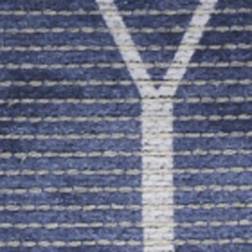 5' X 7' Blue and Ivory Geometric Power Loom Washable Area Rug Photo 1