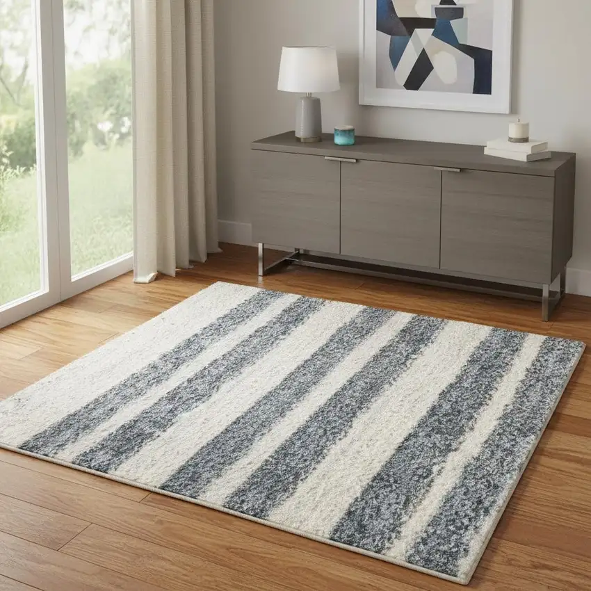 Blue and Ivory Geometric Power Loom Washable Area Rug Photo 1