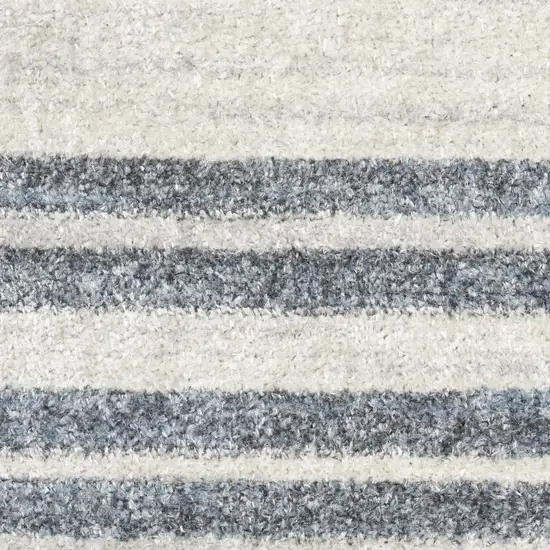 10' Blue And Ivory Geometric Washable Runner Rug Photo 9