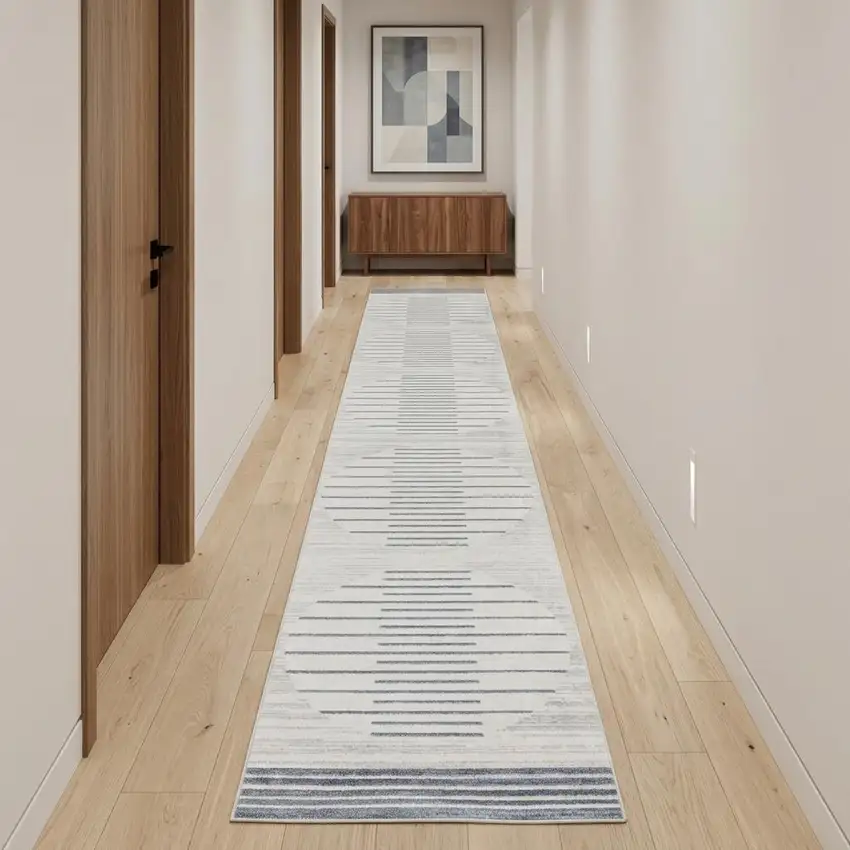 10' Blue And Ivory Geometric Washable Runner Rug Photo 1