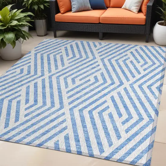 Blue And Ivory Geometric Washable Indoor Outdoor Area Rug Photo 1
