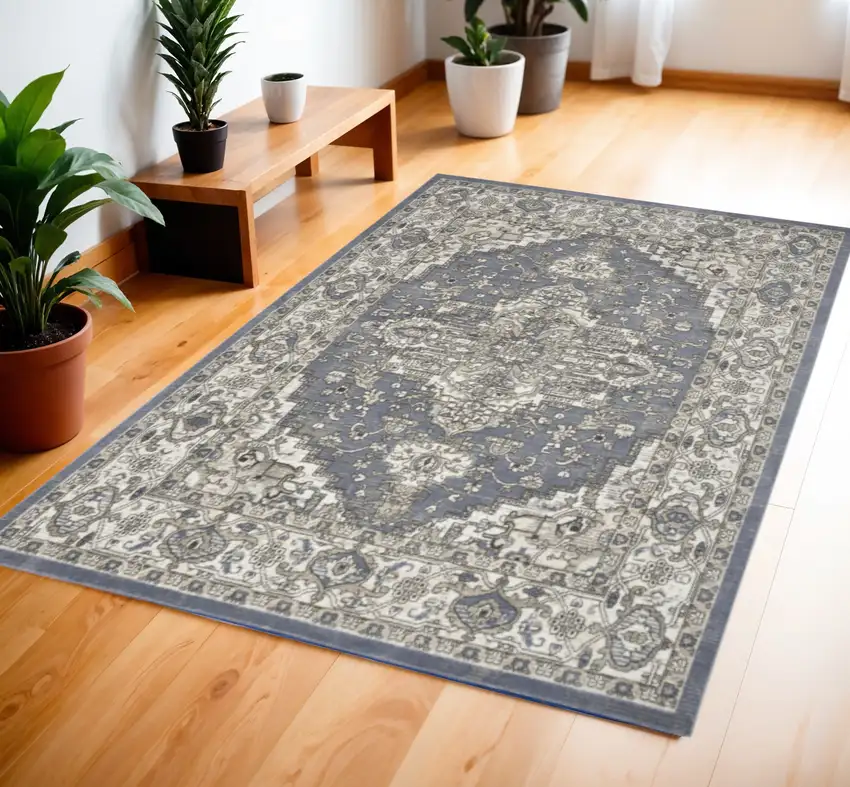 Blue and Ivory Medallion Power Loom Distressed Area Rug Photo 1