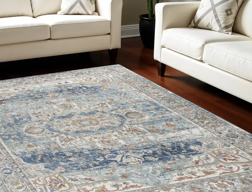 Blue and Ivory Medallion Power Loom Distressed Area Rug Photo 1