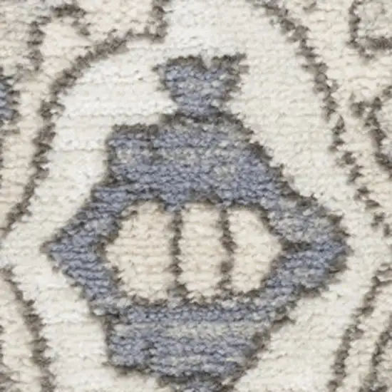Blue and Ivory Medallion Power Loom Distressed Area Rug Photo 4