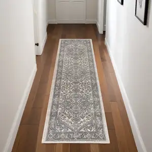 Photo of Blue and Ivory Medallion Power Loom Distressed Runner Rug