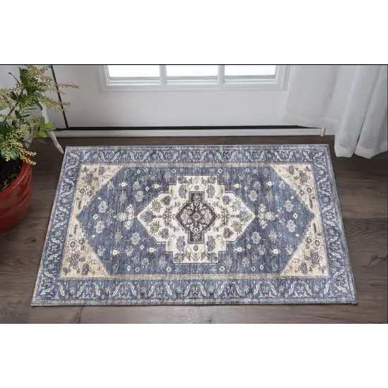Blue and Ivory Medallion Power Loom Distressed Washable Non Skid Area Rug Photo 1