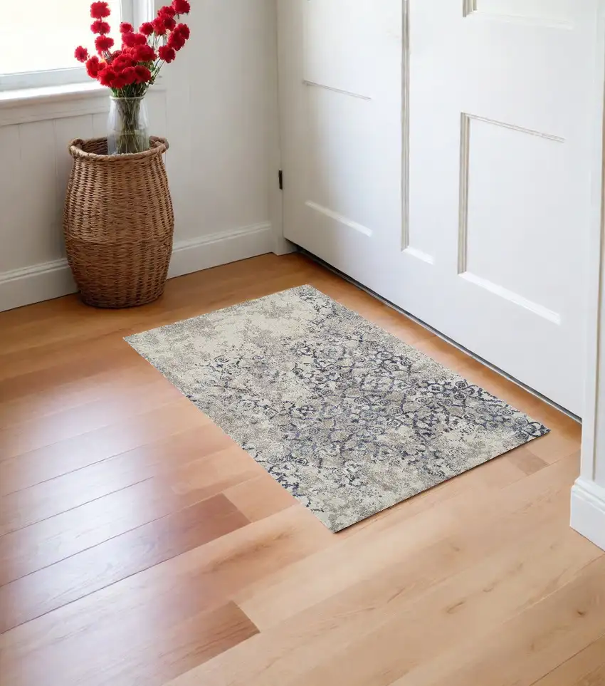 Blue and Ivory Oriental Distressed Area Rug Photo 1