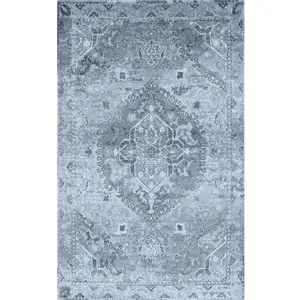 Photo of Blue and Ivory Oriental Distressed Area Rug