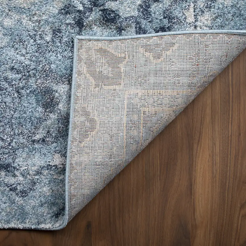 Blue and Ivory Oriental Distressed Area Rug Photo 6