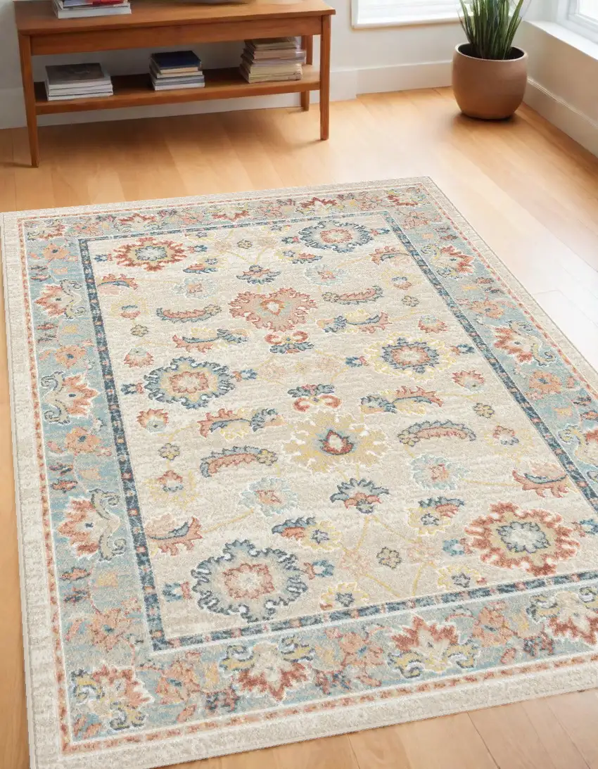 Blue and Ivory Oriental Power Loom Area Rug Photo 1