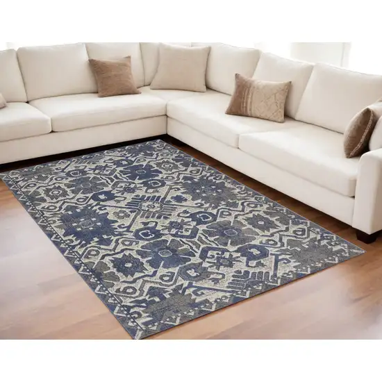 Blue and Ivory Oriental Power Loom Area Rug Photo 1