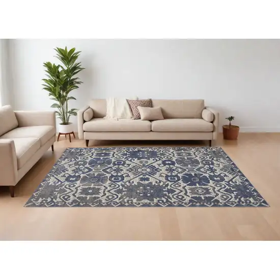 Blue and Ivory Oriental Power Loom Area Rug Photo 1