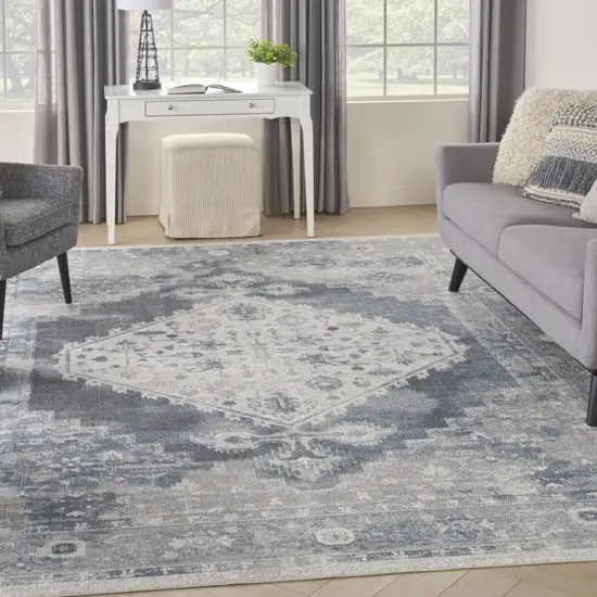 Blue and Ivory Oriental Power Loom Distressed Area Rug Photo 6
