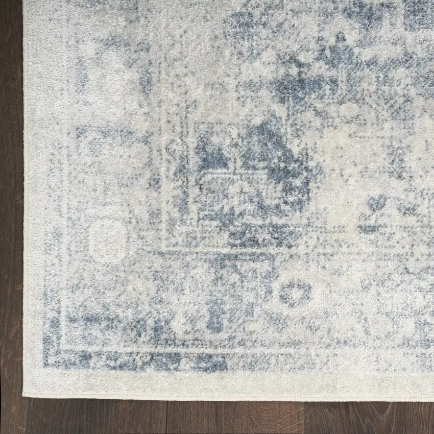 Blue and Ivory Oriental Power Loom Distressed Area Rug Photo 8