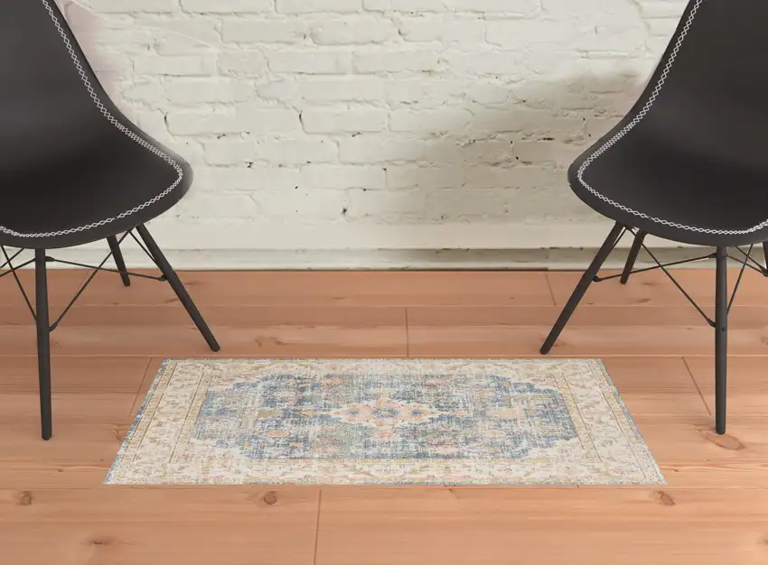 Blue and Ivory Oriental Power Loom Distressed Area Rug Photo 4