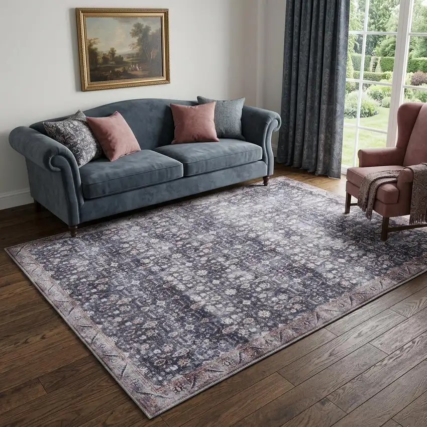 5' X 7' Blue and Ivory Oriental Power Loom Distressed Washable Non Skid Area Rug Photo 1