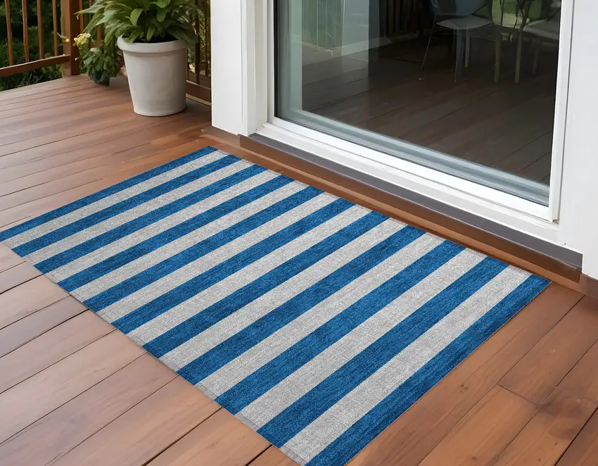 Blue and Ivory Striped Washable Non Skid Indoor Outdoor Area Rug Photo 1