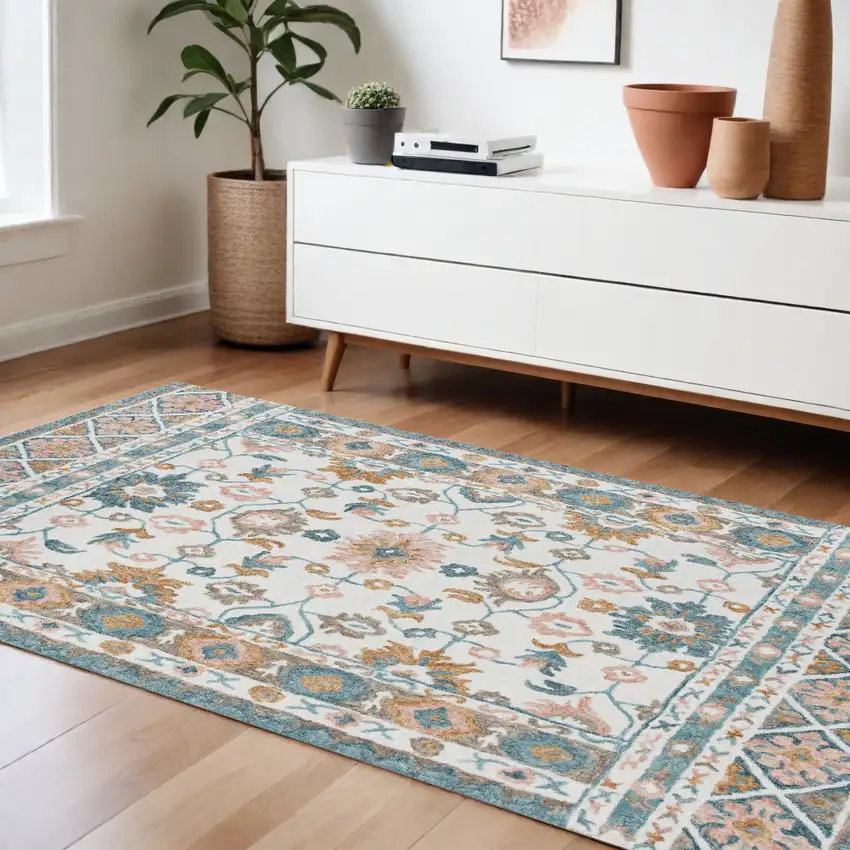 Blue and Ivory Wool Floral Hand Tufted Area Rug Photo 1