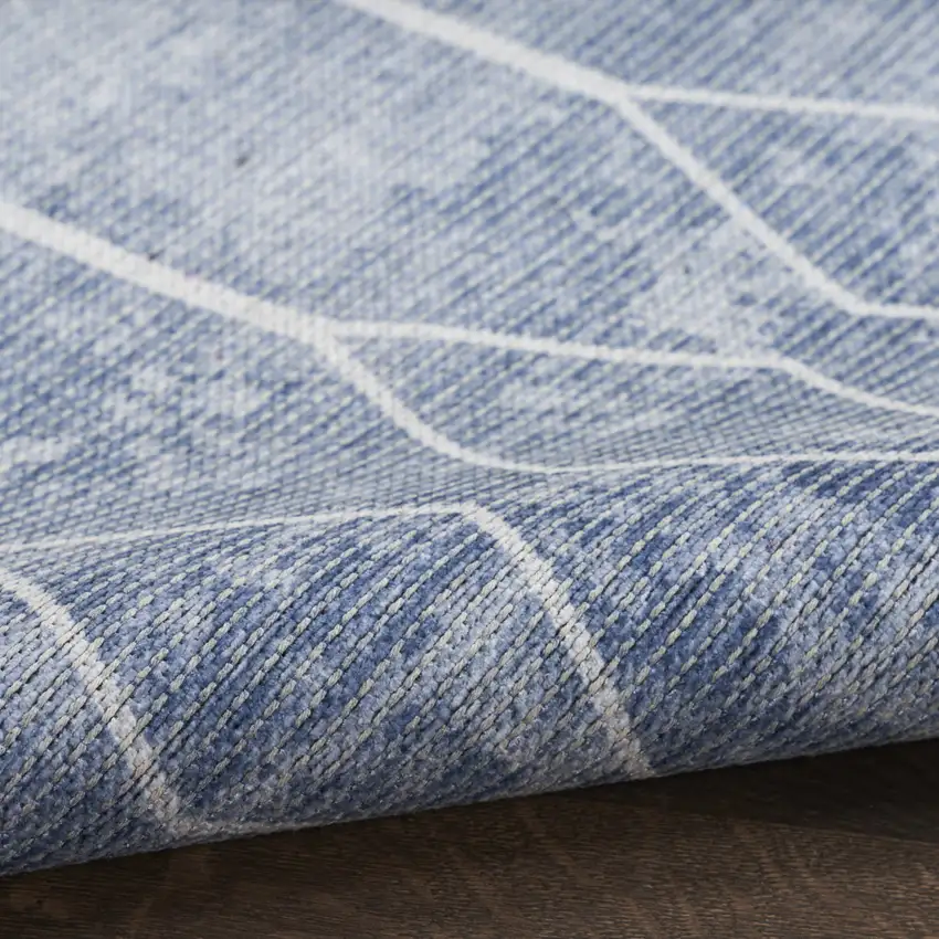 5' X 7' Blue and Off White Geometric Power Loom Washable Area Rug Photo 9