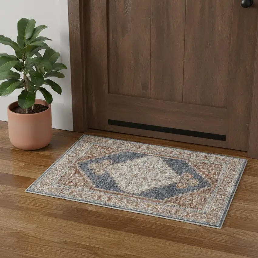 Blue and Orange Floral Medallion Power Loom Distressed Washable Area Rug Photo 1