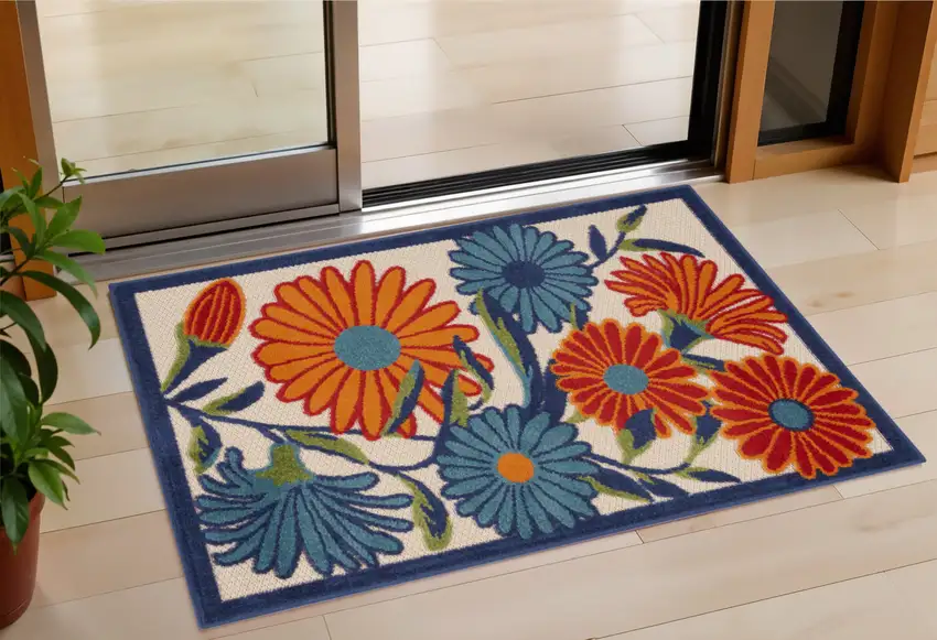 Blue and Orange Floral Power Loom Area Rug Photo 1