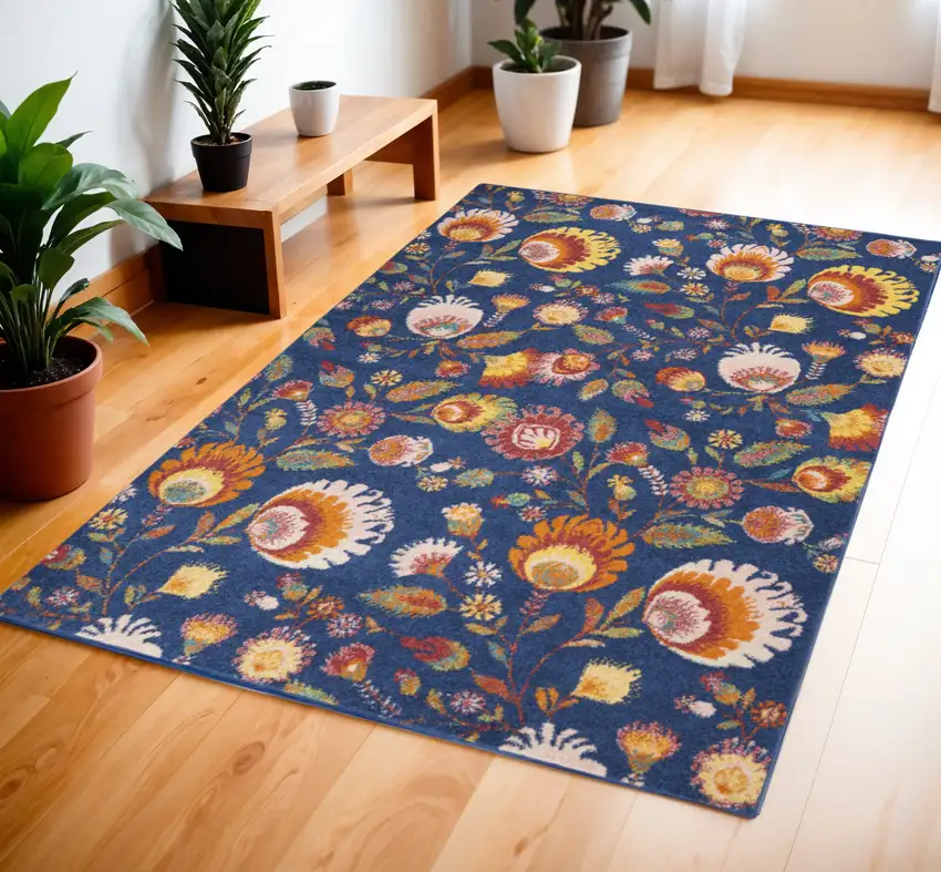 Blue and Orange Floral Power Loom Area Rug Photo 1