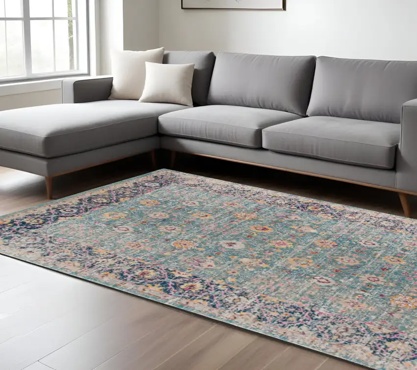Teal Navy and Orange Floral Power Loom Worn Faded Area Rug Photo 1