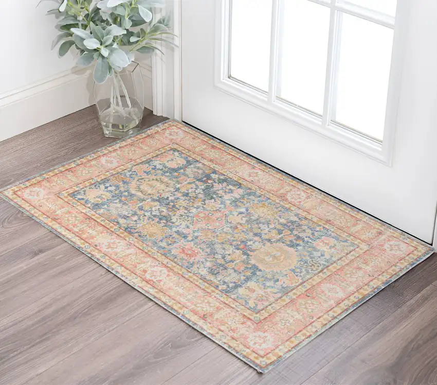 Coral and Blue Oriental Power Loom Worn Faded Area Rug Photo 1