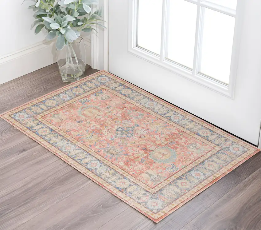 Coral and Blue Oriental Power Loom Worn Faded Area Rug Photo 1