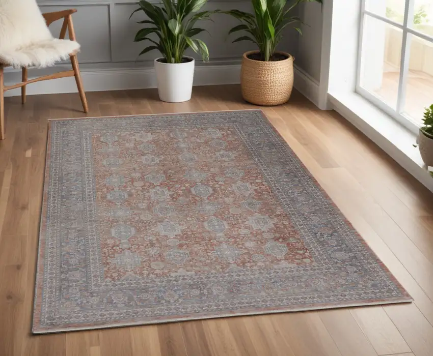 Blue and Red Oriental Power Loom Worn Faded Area Rug With Fringe Photo 1