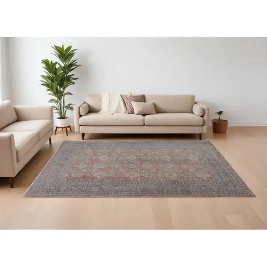 Blue and Red Oriental Power Loom Worn Faded Area Rug With Fringe Photo 1