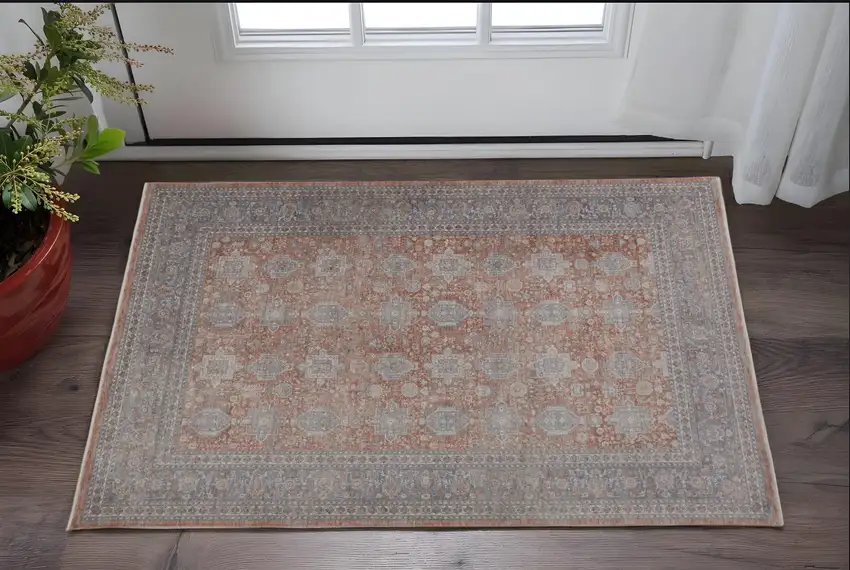 Blue and Red Oriental Power Loom Worn Faded Area Rug With Fringe Photo 1